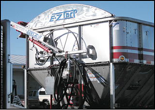 Stainless steel EZ-Tarp system on a stainless steel trailer.