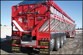 Stainless steel EZ-Tarp system on a 53' semitrailer with a full swing, rear gate.